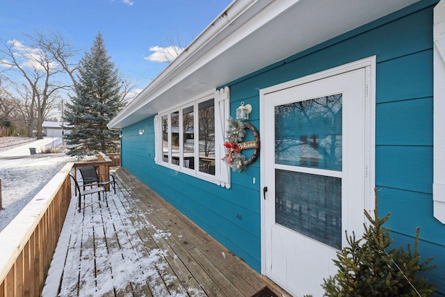 view of snow covered deck