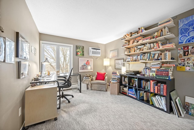 office featuring light colored carpet and a wall mounted AC