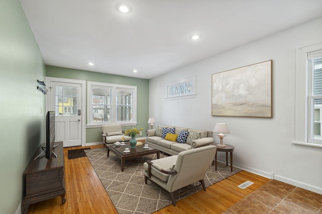 living room featuring dark hardwood / wood-style flooring