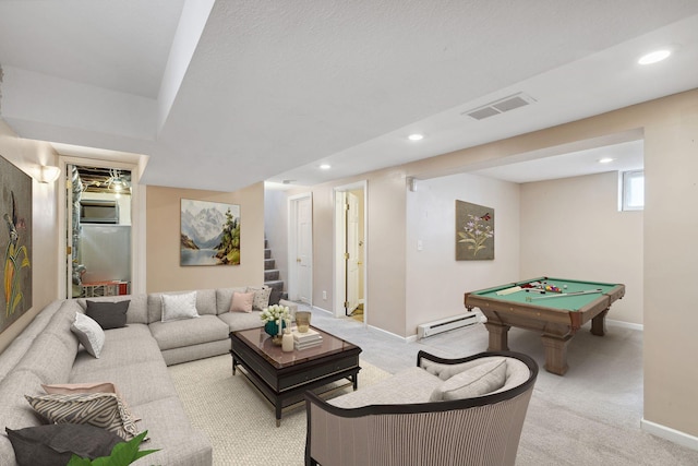 living room with a baseboard heating unit, light carpet, and pool table