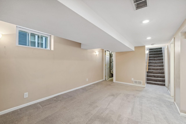 basement with light carpet