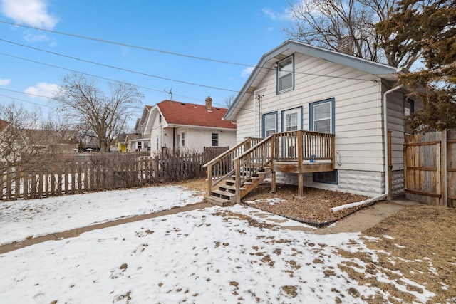 view of snow covered house