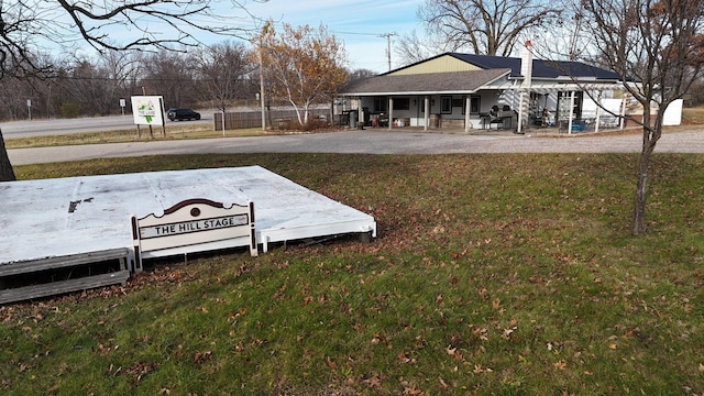 exterior space with a yard