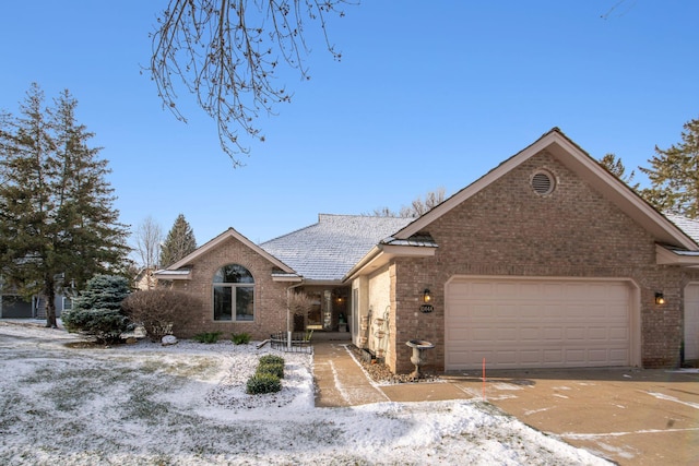 ranch-style house featuring a garage