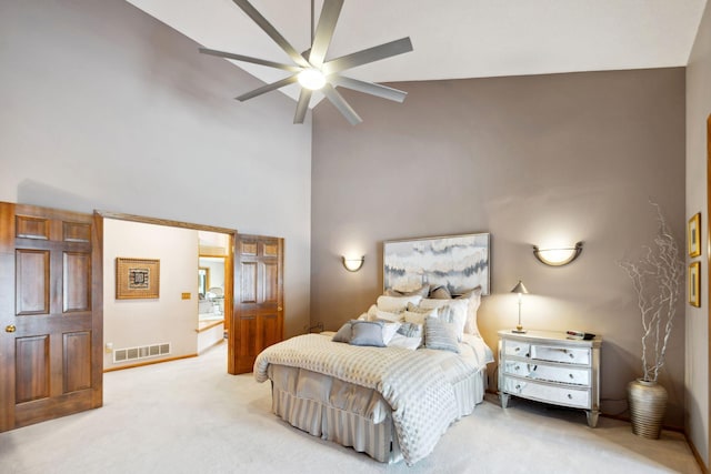 bedroom featuring ceiling fan, carpet floors, and high vaulted ceiling