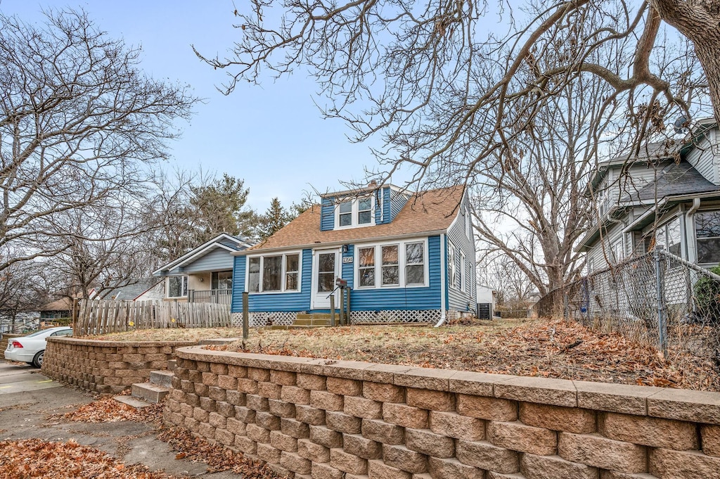 view of new england style home