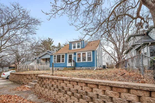 view of new england style home