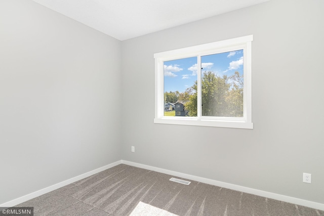 empty room with carpet floors