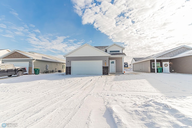 view of front of home with a garage