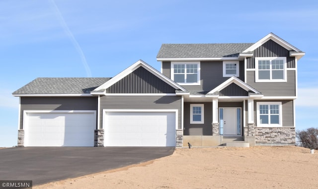 craftsman-style house featuring a garage