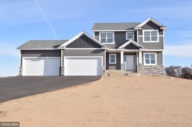 craftsman-style house featuring a garage