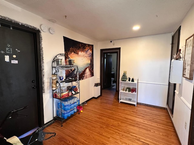 hallway with light wood-type flooring