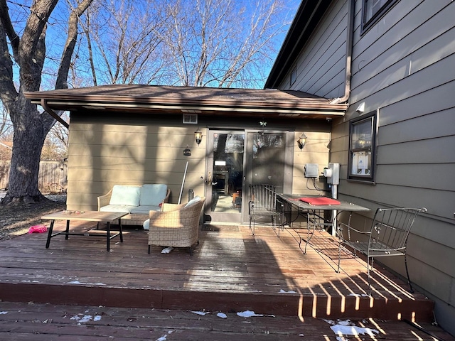 wooden deck featuring outdoor lounge area