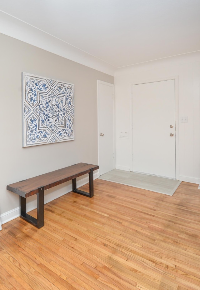 foyer entrance with light wood-type flooring