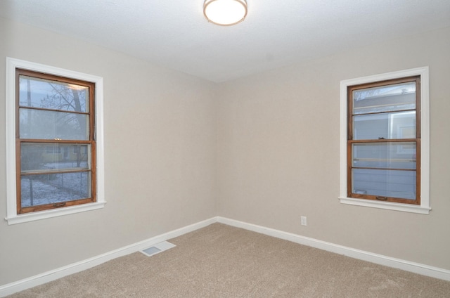 view of carpeted empty room