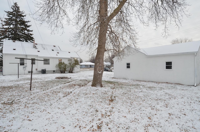 view of yard covered in snow