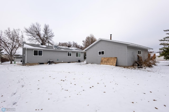 view of snow covered property