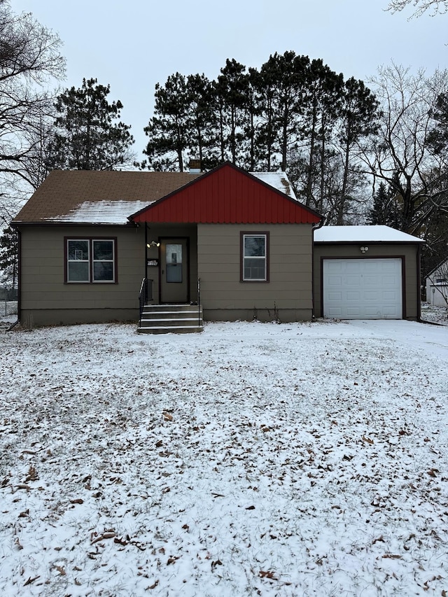 single story home featuring a garage