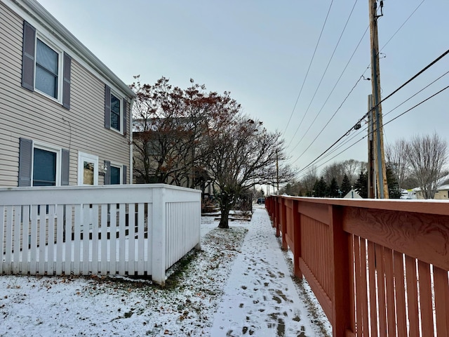 view of yard layered in snow