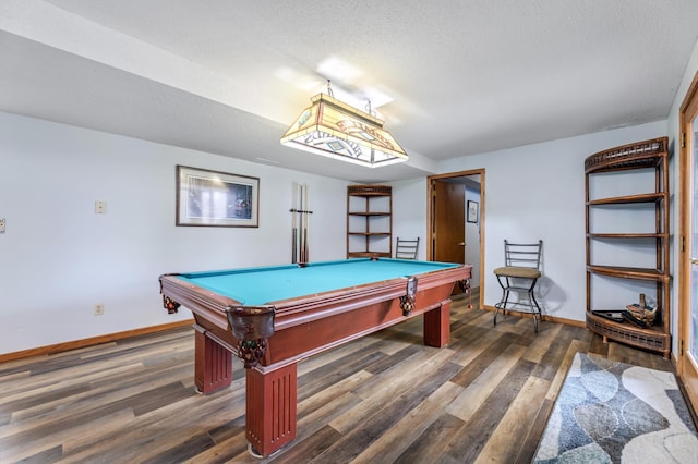 playroom featuring dark hardwood / wood-style flooring, a textured ceiling, and billiards