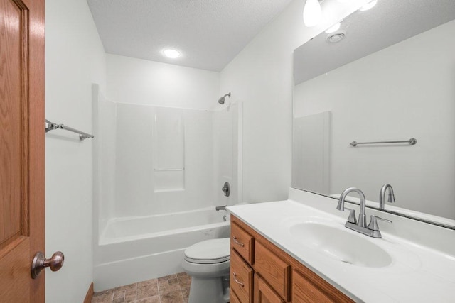 full bathroom featuring vanity,  shower combination, and toilet