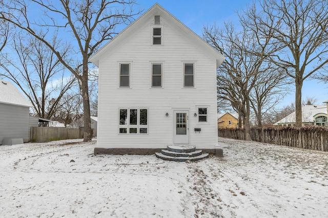 view of snow covered house