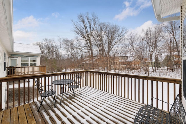 view of snow covered deck