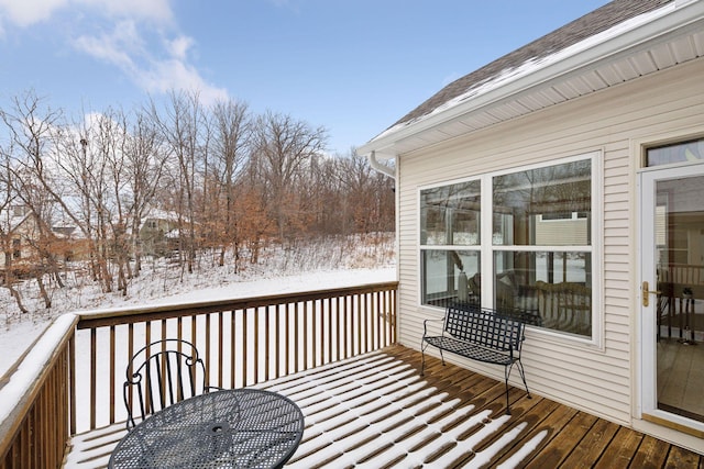 view of snow covered deck