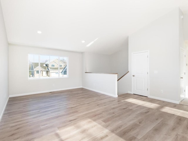 unfurnished room featuring light hardwood / wood-style floors