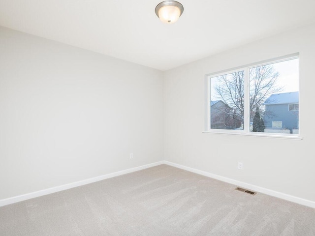 empty room with carpet floors