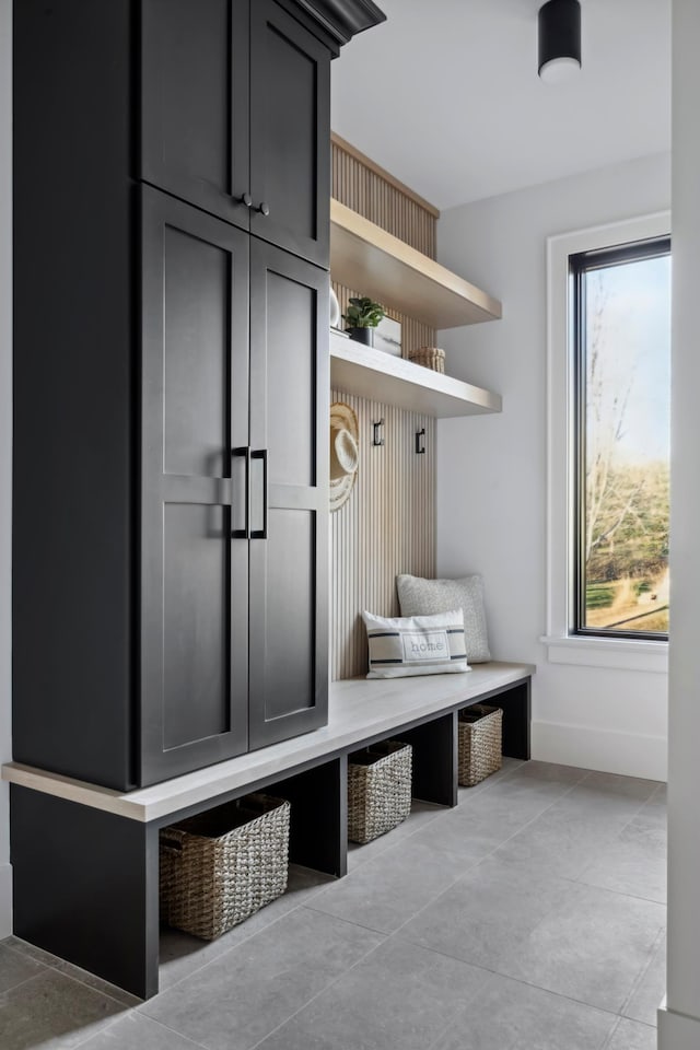 mudroom with light tile patterned flooring