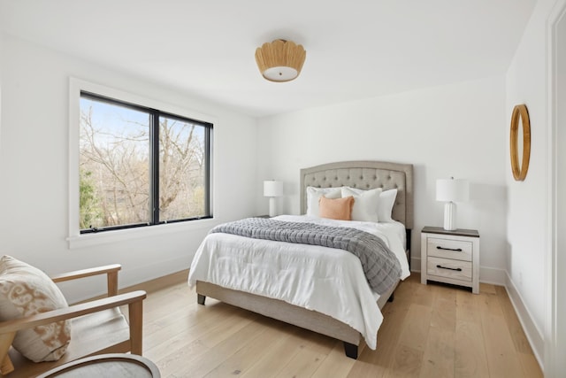 bedroom featuring light hardwood / wood-style flooring