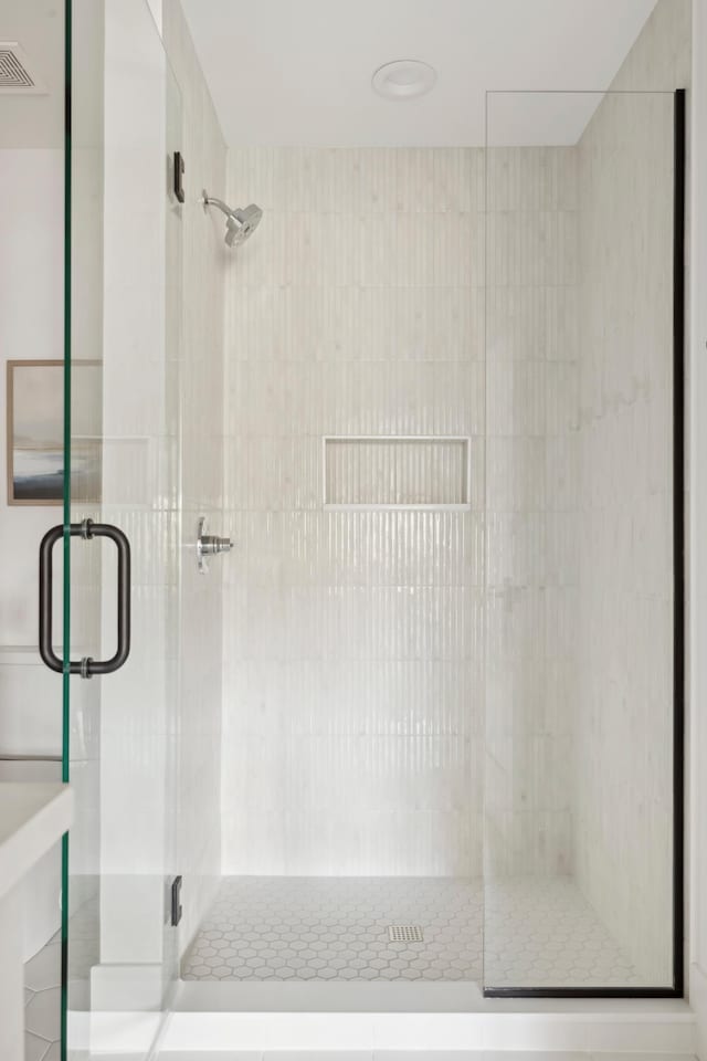 bathroom with walk in shower