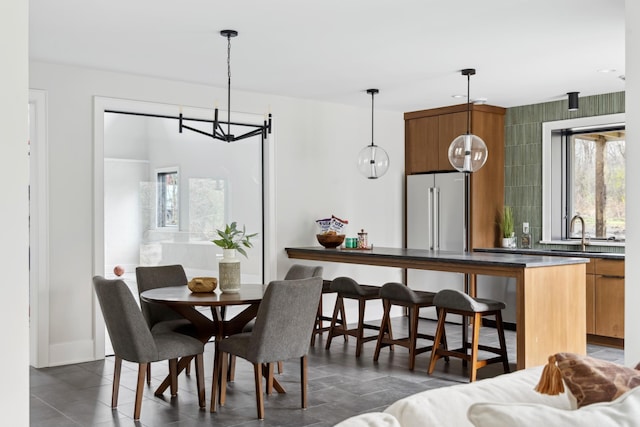 dining space featuring sink