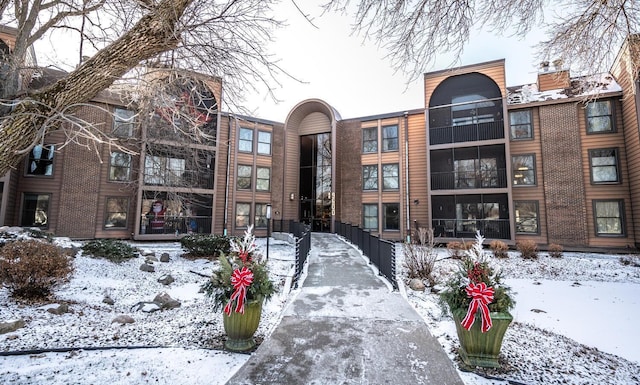 view of snow covered property