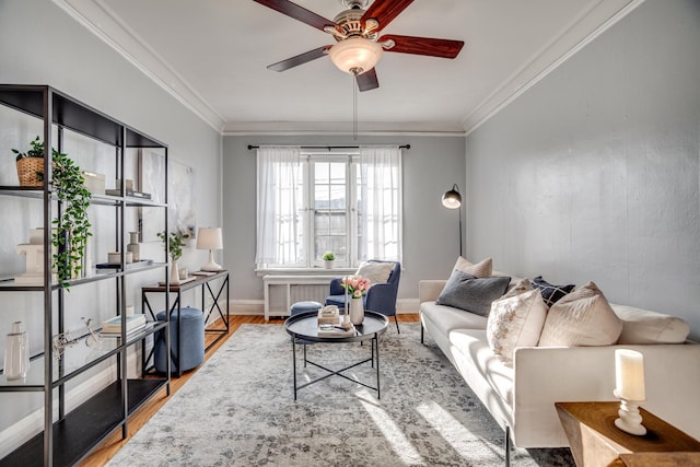 living room with wood-type flooring, crown molding, and radiator