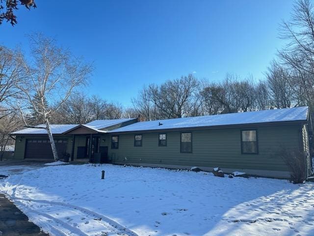 single story home with an attached garage