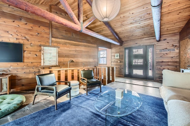 interior space with wooden ceiling, wood walls, and lofted ceiling with beams