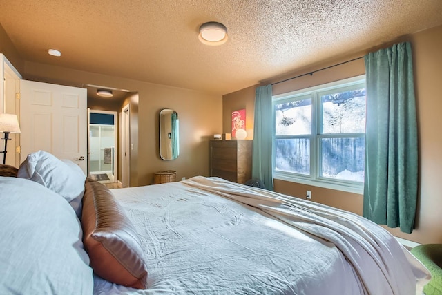 bedroom featuring a textured ceiling