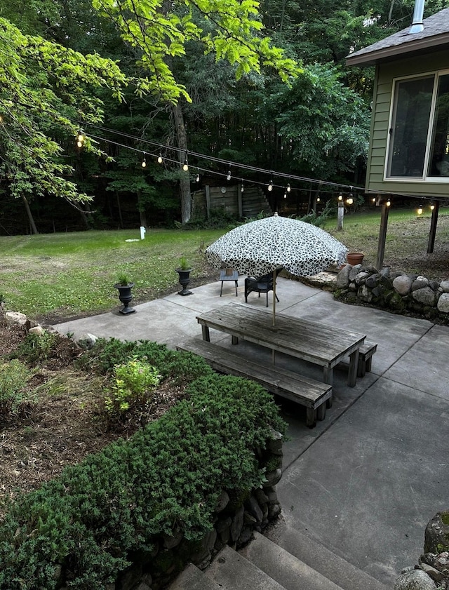 exterior space with a patio area and a yard