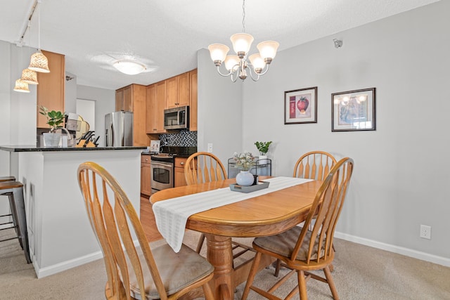 carpeted dining space featuring an inviting chandelier and a textured ceiling