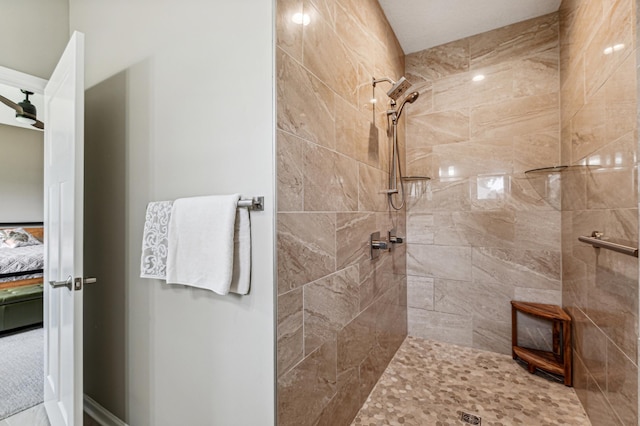 bathroom featuring tiled shower