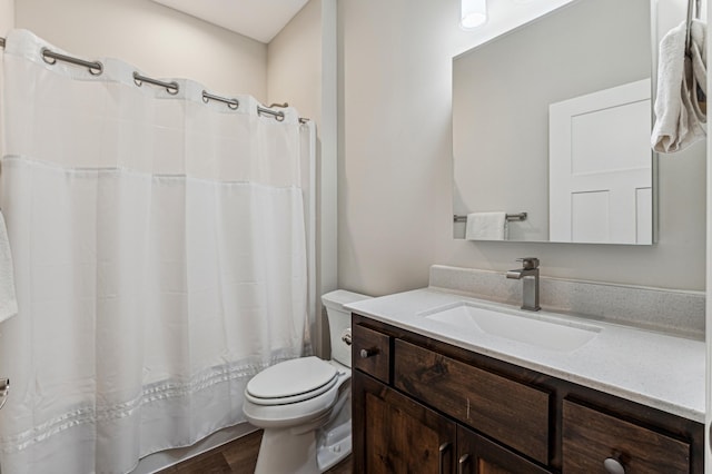 full bathroom with shower / bathtub combination with curtain, vanity, wood-type flooring, and toilet