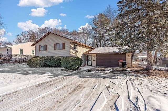 view of front of home with a garage