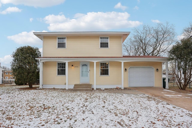 view of front facade with a porch and a garage