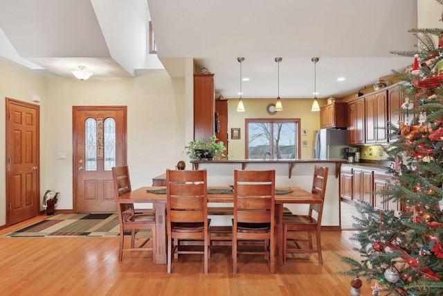 dining room with light hardwood / wood-style floors