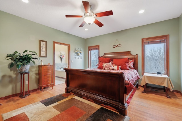 bedroom with ceiling fan and light hardwood / wood-style floors