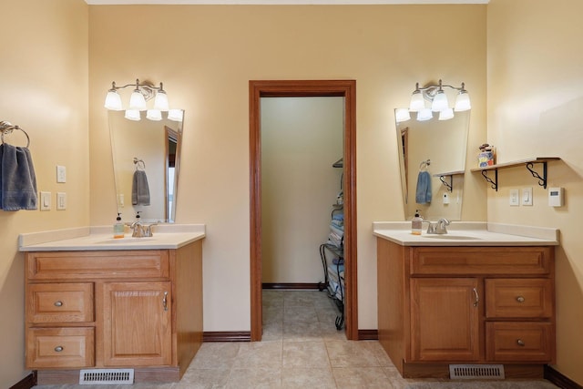 bathroom featuring tile patterned floors and vanity