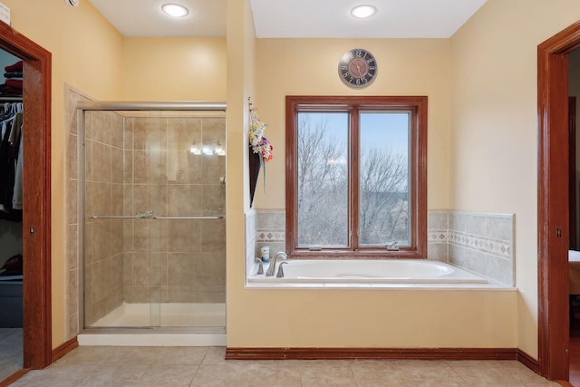 bathroom with plus walk in shower and tile patterned floors