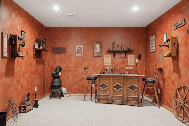 bar featuring light colored carpet